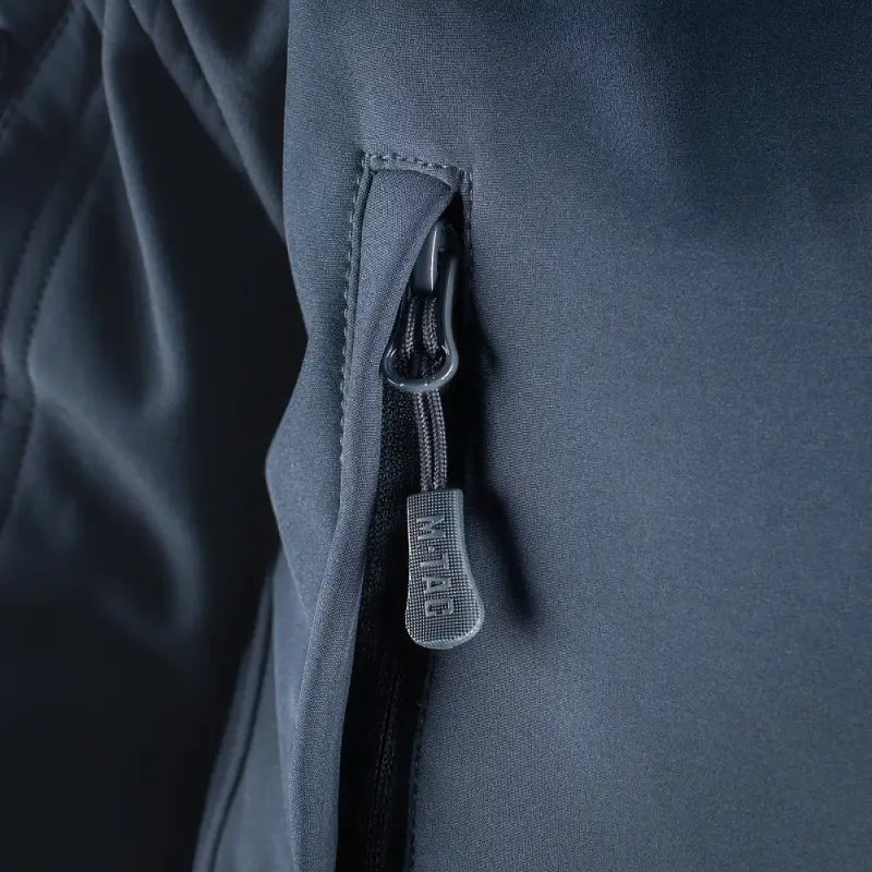 Zipper pull tab on M-Tac Soft Shell Jacket with two shoulder pockets on dark fabric