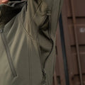 Olive green M-Tac Soft Shell Jacket with zipper details and two shoulder pockets