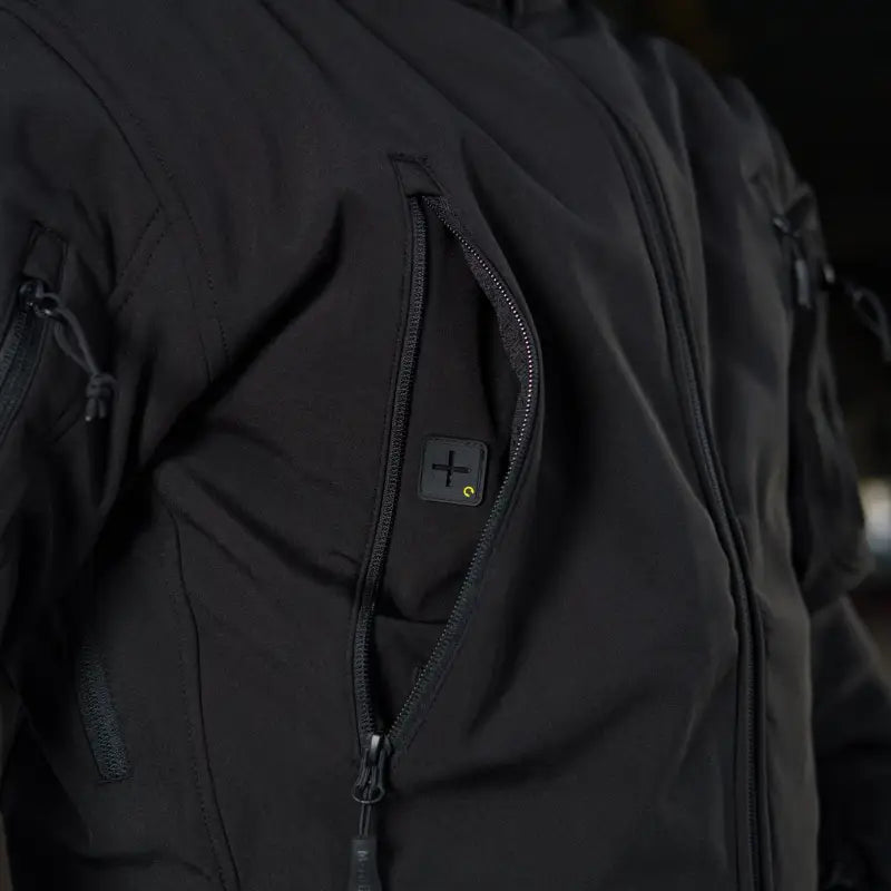 Black M-Tac Soft Shell Jacket featuring a zippered chest pocket and two shoulder pockets