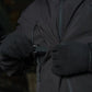 Black M-Tac Soft Shell Jacket with zipper details and two shoulder pockets