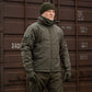 Olive green M-Tac Soft Shell Jacket with liner and two shoulder pockets for winter