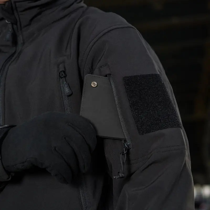 Black M-Tac Soft Shell Jacket with zippered pockets and velcro patch panel