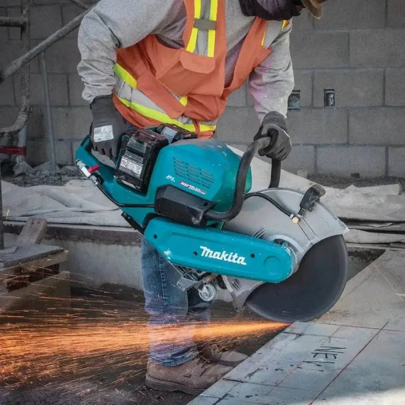 Makita GEC01PL 80V XGT cutting through material with sparks, showcasing its brushless power