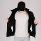 Man in black tactical jacket Bravo with hand pocket showcasing durable tactical jacket style