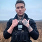 Man wearing black tactical vest with American flag patch in redemption tactical body armor large size