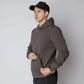 Man in Durable Concealment Hoodie with hand pocket and smooth draws wearing brown hoodie