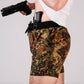 Man wearing Carrier Training Shorts 5 Inch Inseam with camouflage print for concealed carry