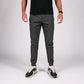 Man wearing gray carrier traveler joggers with concealed carry and carrier retention waistband