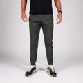 Man wearing gray carrier traveler joggers with concealed carry and carrier retention waistband