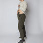 Man with gun in carrier traveler joggers showcasing concealed carry and carrier retention waistband