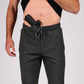 Man with concealed carry gun in waistband wearing Carrier Traveler Joggers with carrier retention waistband