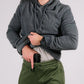 Man conceals handgun in hand pocket of Standoff Concealment Hoodie Mk.II for discreet standoff concealment