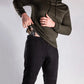 Man concealing handgun with Carrier Joggers Mk.II featuring concealed carry and retention belt