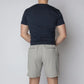 Man wearing navy carrier shorts for concealed carry from Arrowhead Tactical Apparel