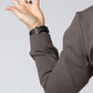 Man’s arm with watch and ring in a Durable Concealment Hoodie showing hand pocket and smooth draws