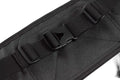 Black plastic buckle with adjustable straps on a fabric surface of Marathon Gun Pack