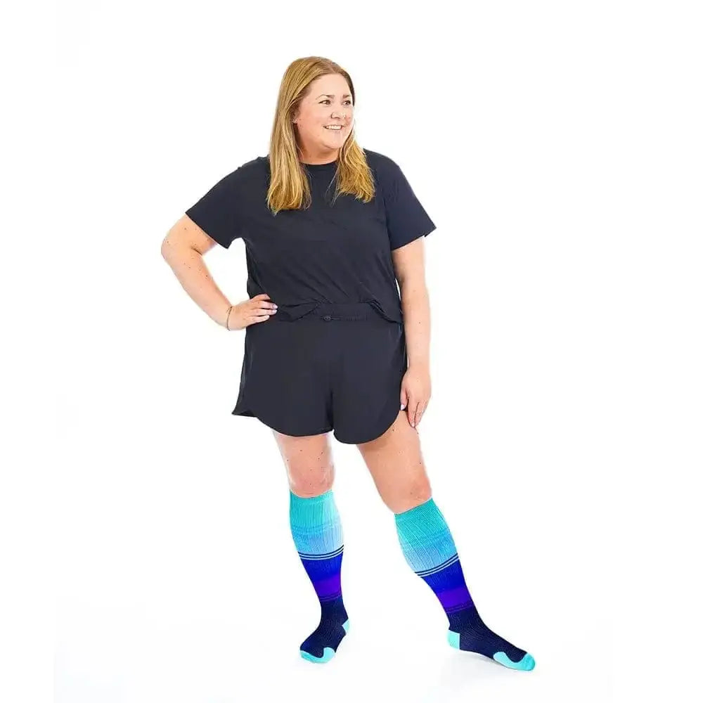 Colorful Minnesota Lakes Marathon Wide-Calf compression socks with a black romper