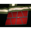 Red geometric shapes with gray lines on a matte red reflective helmet design