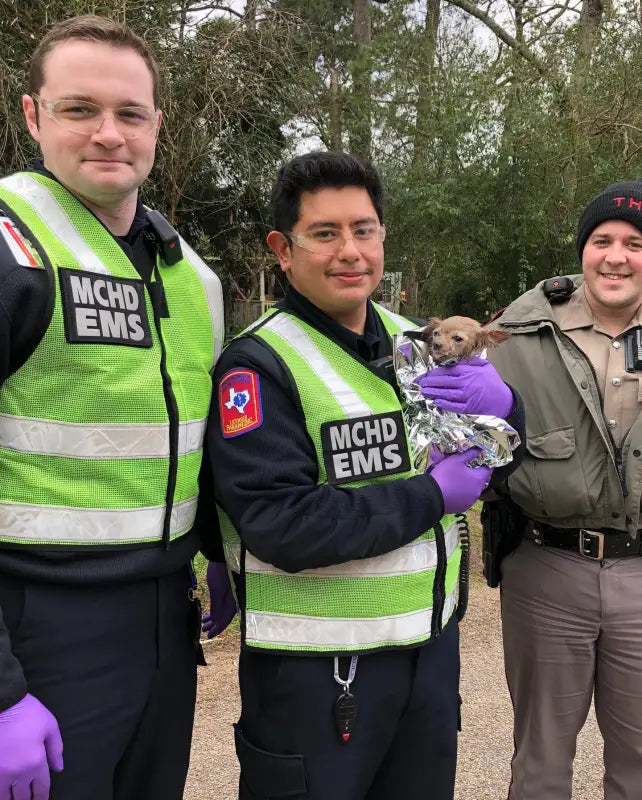 EMS personnel in reflective safety vests, showcasing MCHD ANSI II Adjustable Vest