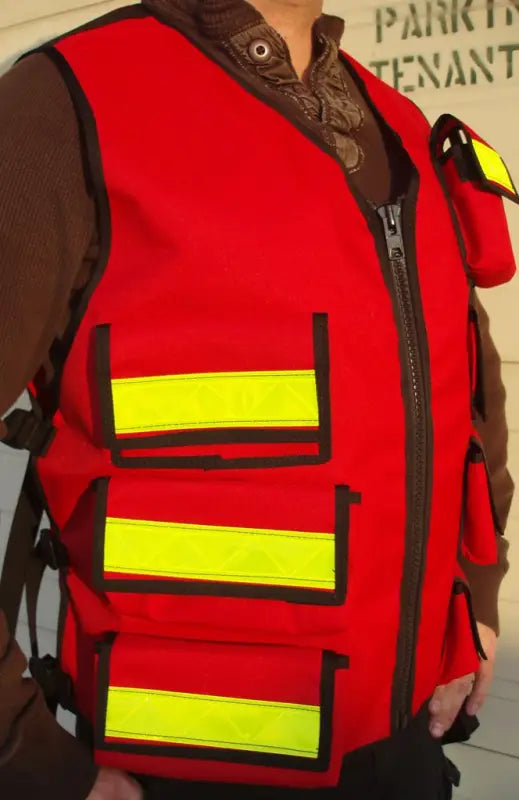 Red Medic 7 Vest for first responders with reflective yellow stripes and black trim