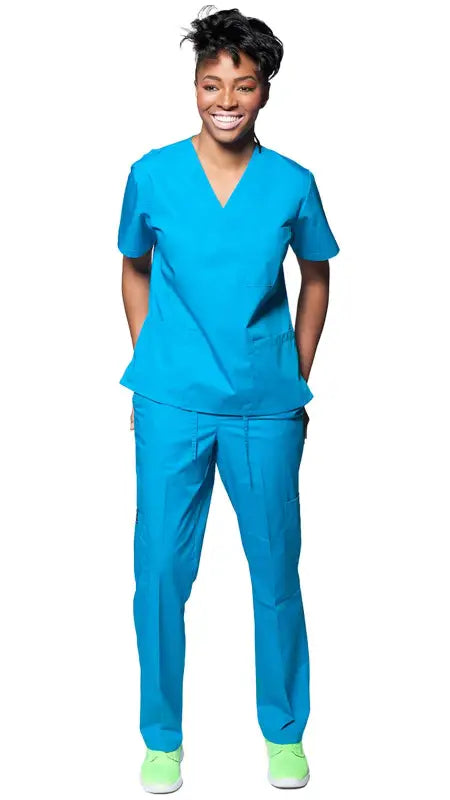 Medical professional in Women’s Classic 8 Pocket Uniform Scrubs with neon green sneakers