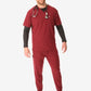 Medical professional in burgundy men’s double-pocket scrub top with stethoscope