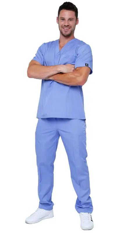 Medical professional in light blue classic uniform scrubs with white shoes and pockets