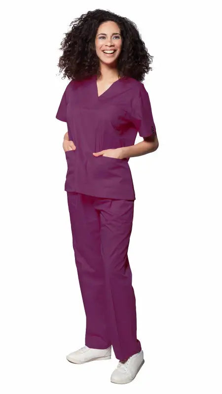 Medical professional in Women’s Classic 8 Pocket Uniform Scrubs with pen slot and white shoes