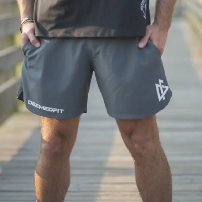 Gray men’s shorts Response with DEEMEDFIT branding and geometric logo for first responders