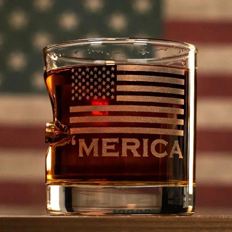 Glass tumbler with amber liquid, etched American flag, and Merica text for whiskey lovers