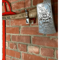 Metal cleaver with engraved skull design for a personalized customizable axe