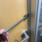 Metal door security bar installation using the 12’’ XL Ti Hooligan Forced Entry Tool