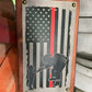 Metal Firefighter Thin Red Line Flag featuring children silhouettes and American flag design