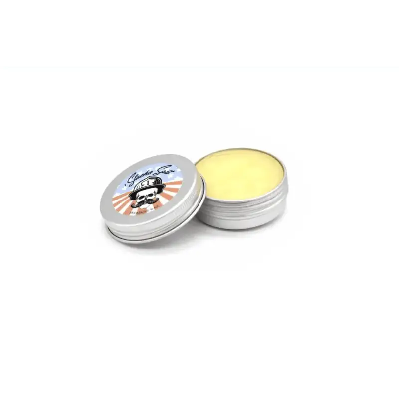 Metal tin of Ol’ Fashion Light Hold Mustache Wax with decorative lid design