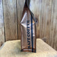 Copper-colored European Espresso Blend Coffee bag with black stripe and CRAFT COFFEE print