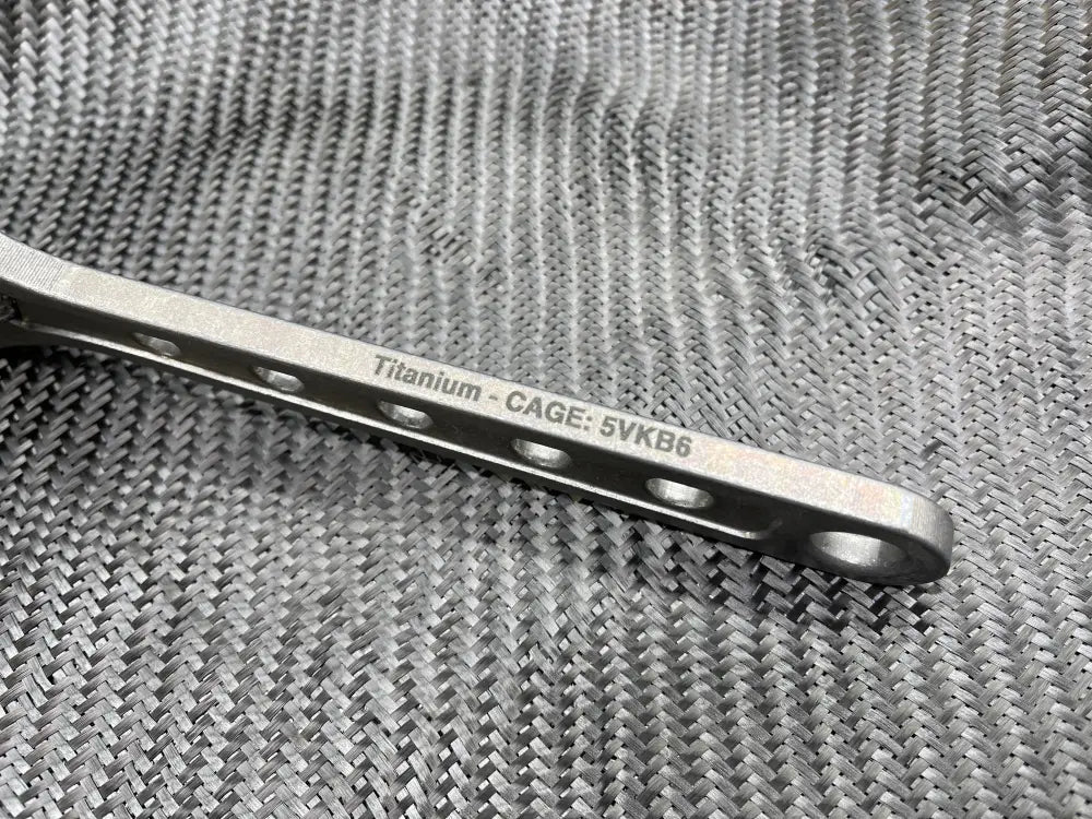 Metallic Titanium gage spoon with holes for the 8 Inch Titanium Adjustable Wrench