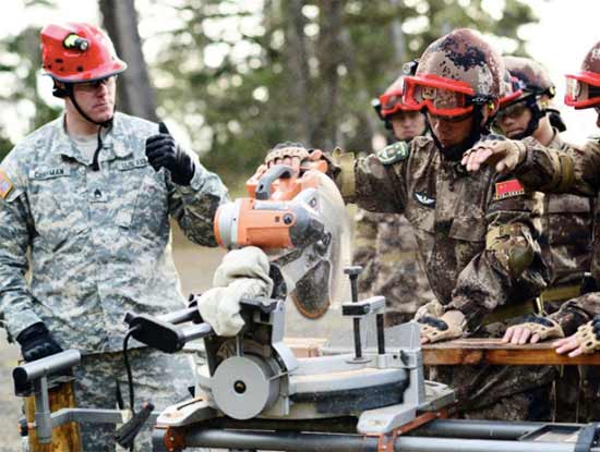 Miter saw being used by soldiers with Finger Cut Kit for safety and precision