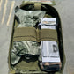 Military-style First Responder IFAK Kit with tourniquets and bandages for emergencies