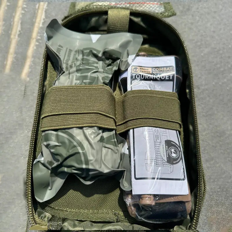 Military-style First Responder IFAK Kit with tourniquets and bandages for emergencies