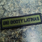 Military morale patch featuring ’Big Booty Latinas’ in black on olive drab fabric