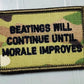 Military morale patch in Multicam w blk, reading Beatings Will Continue Until Morale Improves