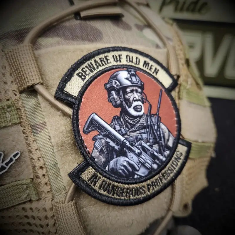 Military-style embroidered sublimated patch featuring tactical operator and Beware of Old Men text