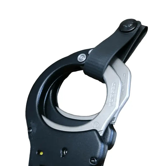 Black and silver hinged handcuffs featured in a Minimalist Cuff Holder design