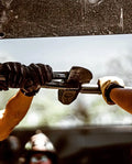 Motorcycle handlebar with black grips and controls for TSR FIRE MAUL for first responders