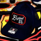 Navy blue baseball cap with Engine 51 patch and square passport cursive lettering design