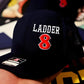 Navy blue baseball cap with LADDER 8 design for first responders by Apparatus Company - Offset