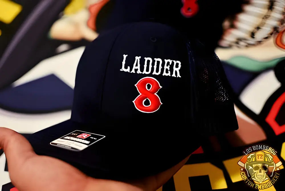 Navy blue baseball cap with LADDER 8 design for first responders by Apparatus Company - Offset