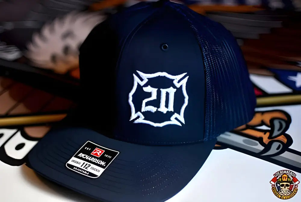 Navy blue Custom Richardson cap with iconic Maltese Cross and puff embroidery logo