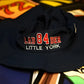 Navy blue Game Boonie hat with LAD 84 DEK LITTLE YORK station number lower text