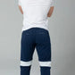 Navy blue Carrier Joggers Mk.II with white reflective stripes and patented carrier retention waistband